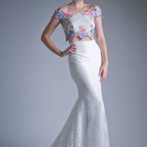 Two piece off the shoulder fitted dress with embroidered floral appliques and lace detailed skirt.